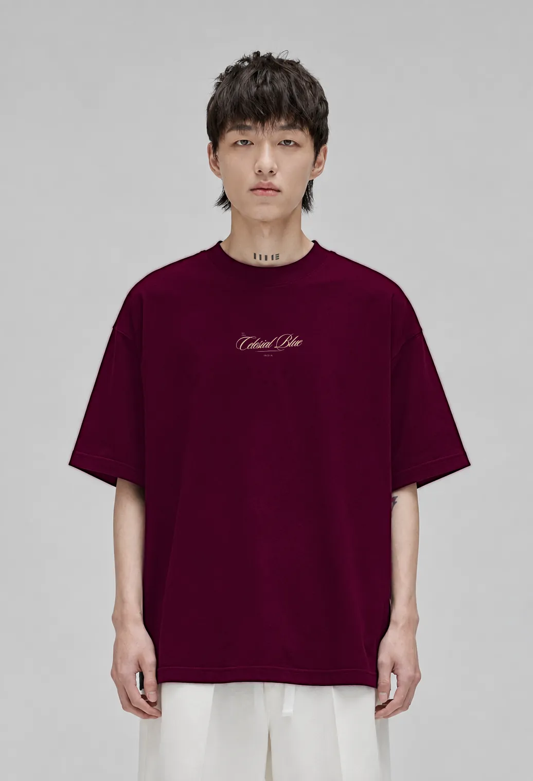 Model wearing the burgundy Celesial Blue Classic oversized t-shirt
