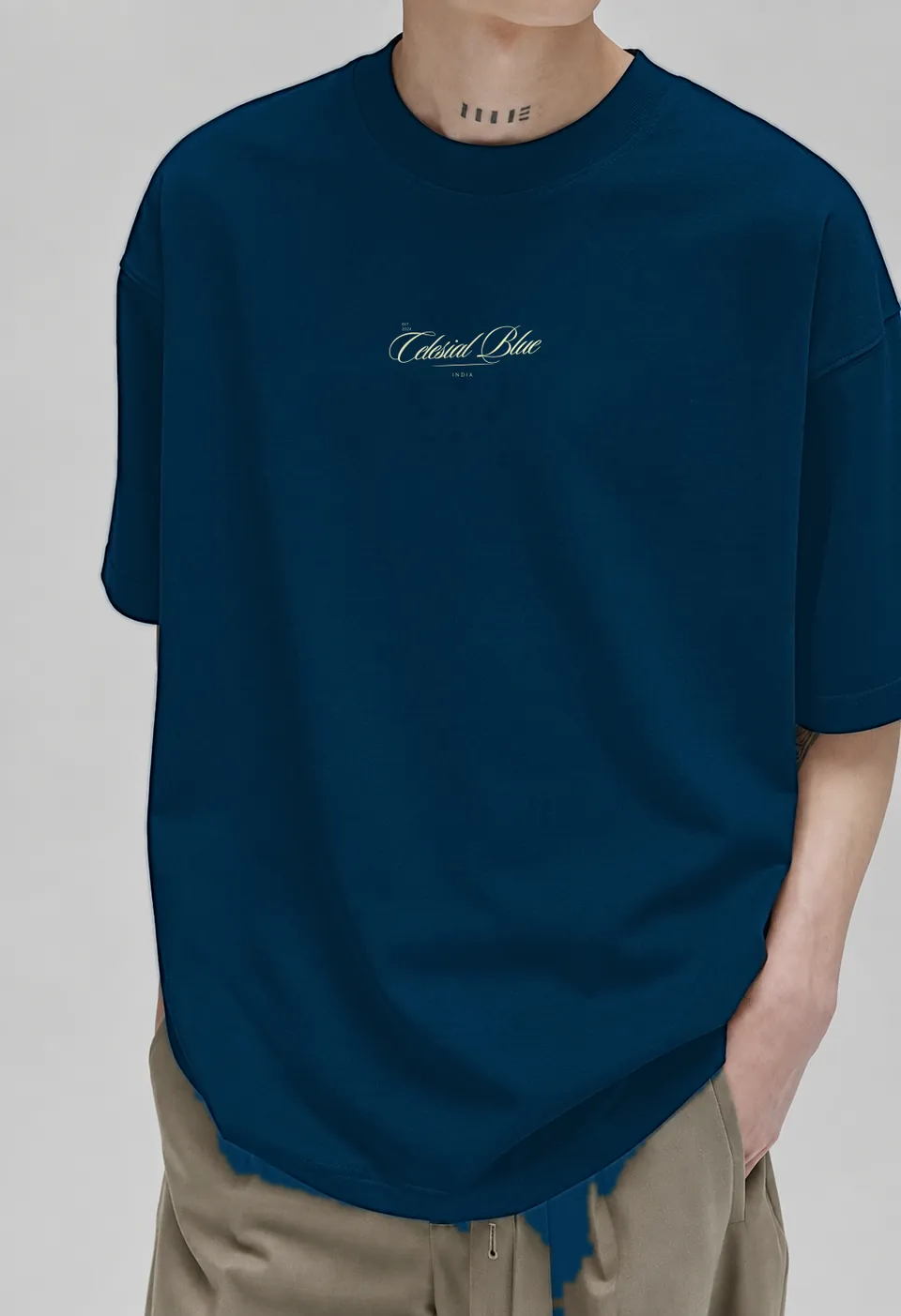 Model in the navy blue Classic oversized t-shirt, three-quarter view