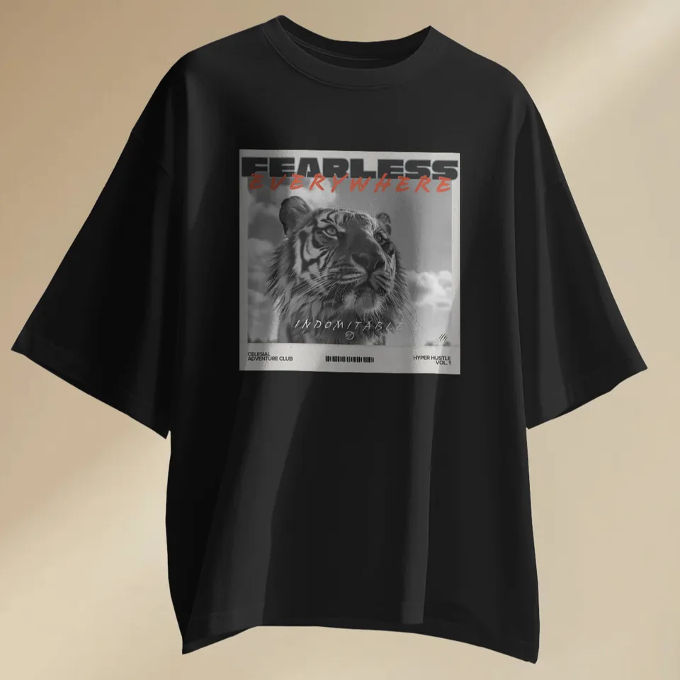 Black oversized t-shirt with the Fearless tiger print, laid flat