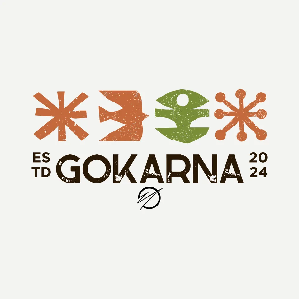 The Gokarna print artwork: orange and green block-print symbols above GOKARNA, Estd 2024