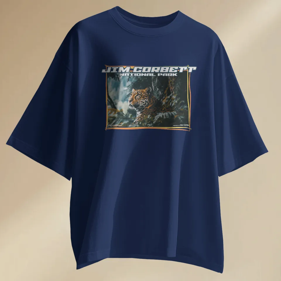 Navy blue oversized t-shirt with the Jim Corbett leopard print, laid flat