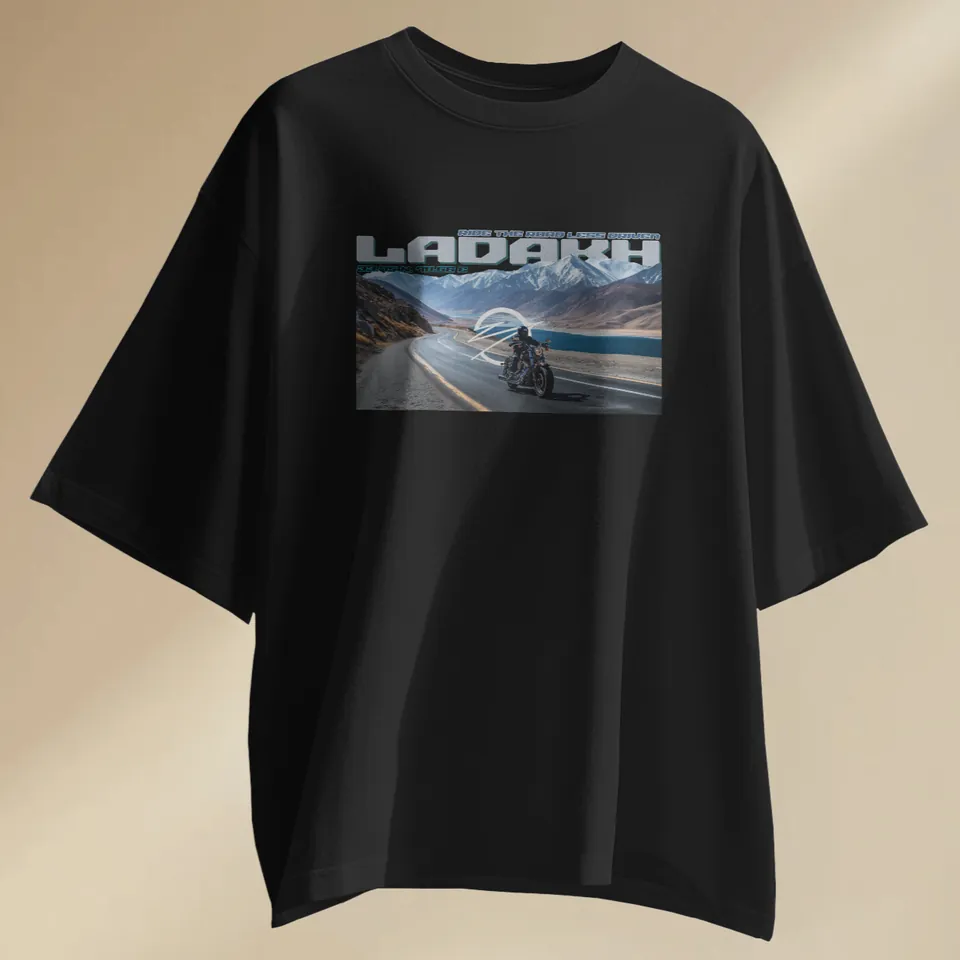 Black oversized t-shirt with the Ladakh road print, laid flat