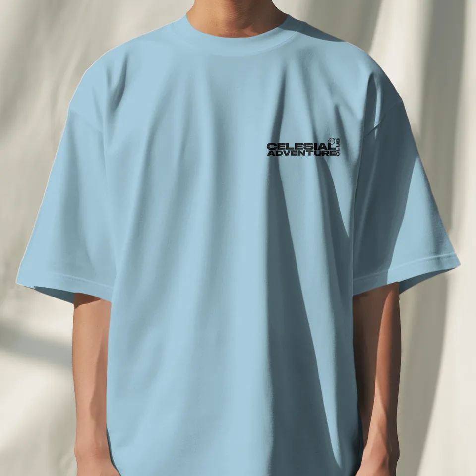 Model wearing the Rare Blue Consciousness oversized t-shirt, front view