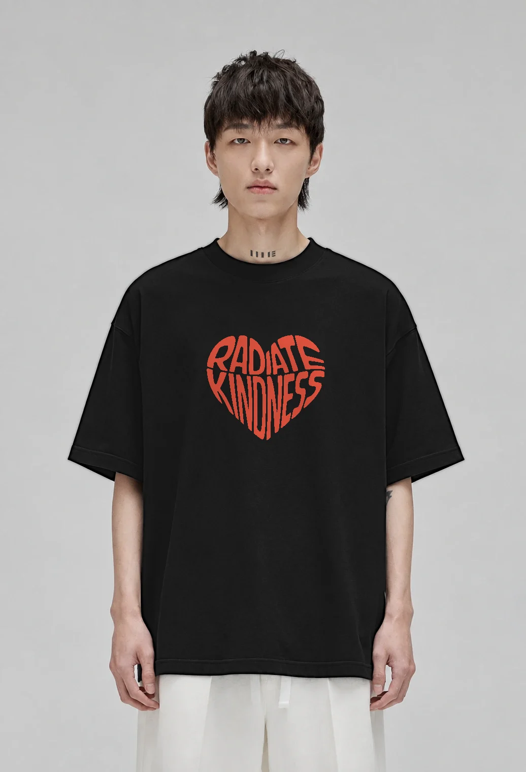 Radiate Kindness oversized t-shirt, black, front view